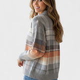 Blusa de malha quadriculada em tons suaves