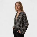 Blusa elegante com decote em V